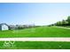 Community soccer field surrounded by lush grass and neighborhood homes at 15304 Fairlands Dr, Westfield, IN 46074