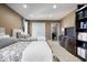 Shared bedroom featuring two beds, dresser with TV, and closet at 1621 Rosebud Ln, Greenwood, IN 46143