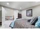 Bedroom with brown patterned bedding and doorway access to another room at 1621 Rosebud Ln, Greenwood, IN 46143