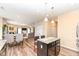 Open-concept kitchen flows into dining and living areas, creating an inviting space at 16406 Taconite Dr, Noblesville, IN 46060