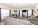Inviting living room with a fireplace, ample seating, and a TV for entertainment at 16406 Taconite Dr, Noblesville, IN 46060