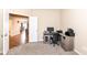 Inviting office space with desk, chair, and view into other living areas at 16406 Taconite Dr, Noblesville, IN 46060