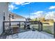 Relaxing back deck with grill, seating, and string lights, overlooking the expansive backyard at 16736 Workington Way, Westfield, IN 46074