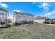 Expansive backyard featuring a fire pit area, deck, and gazebo, perfect for outdoor living at 16736 Workington Way, Westfield, IN 46074