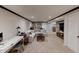 Expansive basement features an entertainment area, workspace, and cozy seating with Gathering photos at 16736 Workington Way, Westfield, IN 46074