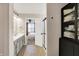 Bathroom showcases an open doorway to the bedroom, a standing shower, and a cabinet for linen storage at 16736 Workington Way, Westfield, IN 46074