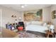Stylish bedroom featuring a comfortable bed, unique wall art, and a cozy seating area with a contemporary flair at 16736 Workington Way, Westfield, IN 46074