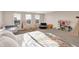 Spacious bonus room featuring many toys and a comfortable space for relaxation and play at 16736 Workington Way, Westfield, IN 46074
