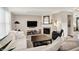 Bright living room featuring a fireplace, comfortable seating, and stylish decor at 16736 Workington Way, Westfield, IN 46074