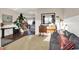 Comfortable living room featuring hardwood floors, stylish furniture, and an open layout at 16736 Workington Way, Westfield, IN 46074