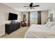 This main bedroom is complete with a TV, chair, carpet and lots of natural light at 16736 Workington Way, Westfield, IN 46074