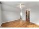 Cozy bedroom with hardwood floors, ample natural light, and an en-suite bathroom at 1711 Kessler E Blvd, Indianapolis, IN 46220
