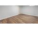 Bright bedroom with new wood floors, fresh paint, and closet for ample storage space at 1711 Kessler E Blvd, Indianapolis, IN 46220