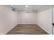 Room with new wood floors and baseboards, and freshly painted walls at 1711 Kessler E Blvd, Indianapolis, IN 46220