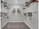 This walk-in closet provides ample storage with built-in shelving and organizational bins at 181 Cline St, Westfield, IN 46074