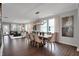 This dining room features an open concept with modern light fixture and wood flooring at 181 Cline St, Westfield, IN 46074