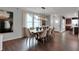 Formal dining room features neutral paint, natural light, and wood floors at 181 Cline St, Westfield, IN 46074