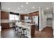 Well-equipped kitchen features stainless steel appliances, an island with seating, and ample counter space at 181 Cline St, Westfield, IN 46074
