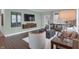 Relaxing living area has a neutral palette and mounted TV at 181 Cline St, Westfield, IN 46074
