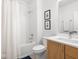 Bright bathroom features a shower, vanity, and toilet at 1838 Alabama St, Indianapolis, IN 46202