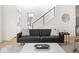 Cozy living room featuring a stylish sofa, modern decor, and bright windows at 1838 Alabama St, Indianapolis, IN 46202
