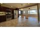Spacious kitchen with stainless appliances, tile backsplash, and an open layout at 204 W Pullman St, Waldron, IN 46182