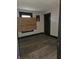 Modest bedroom with plywood covering the window at 238 S Temple Ave, Indianapolis, IN 46201