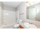The bathroom includes a shower-tub combo, granite vanity, a mirror, and a toilet at 3026 Everbloom Way, Indianapolis, IN 46217