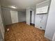 The kitchen includes white cabinets and a tiled floor at 3044 Manor Ct, Indianapolis, IN 46218