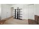 Bedroom with a sleeper sofa and wall shelving unit and a closet at 3052 Skylar Ln, Indianapolis, IN 46208