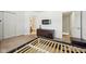 Spacious bedroom features neutral carpet with a view into an en-suite bathroom at 3052 Skylar Ln, Indianapolis, IN 46208