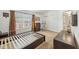 Well lit bedroom featuring a large window, neutral carpet and dark wood furniture at 3052 Skylar Ln, Indianapolis, IN 46208