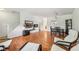 Bright and airy living space with hardwood floors, an open layout, and contemporary decor at 3052 Skylar Ln, Indianapolis, IN 46208