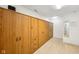 Large storage cabinets in a hall featuring lots of drawers and doors for storing personal items at 3052 Skylar Ln, Indianapolis, IN 46208