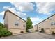 Row of townhouses with one-car garages in a well-maintained community at 3052 Skylar Ln, Indianapolis, IN 46208