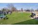 Spacious backyard features a well-maintained lawn, perfect for outdoor activities and Gathering gatherings at 348 W Stop 11 Rd, Indianapolis, IN 46217