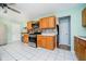 Kitchen features stainless steel appliances, tile backsplash, and light wood cabinets at 348 W Stop 11 Rd, Indianapolis, IN 46217