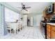 Bright eat-in kitchen with stainless steel appliances and tile floor at 348 W Stop 11 Rd, Indianapolis, IN 46217