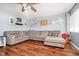 Spacious living room featuring hardwood floors, a large sectional sofa, and ample wall decor at 348 W Stop 11 Rd, Indianapolis, IN 46217