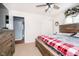 Bedroom features wood furniture and neutral carpet at 348 W Stop 11 Rd, Indianapolis, IN 46217