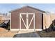 Durable backyard shed with secure double doors for ample storage of tools and equipment at 348 W Stop 11 Rd, Indianapolis, IN 46217