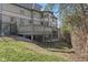 Large deck and manicured yard off the back of the home at 3608 Olive Branch Rd, Greenwood, IN 46143