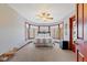 Inviting bedroom features a bay window, ceiling fan, and neutral carpet and paint at 3608 Olive Branch Rd, Greenwood, IN 46143