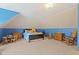 Charming bedroom with blue walls, a cozy bed, and a table set perfect for playing games at 3608 Olive Branch Rd, Greenwood, IN 46143