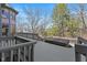 Large deck with seating area and hot tub at 3608 Olive Branch Rd, Greenwood, IN 46143