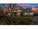 Stunning two-story home featuring a beautiful wrap-around porch and lush lawn at 3608 Olive Branch Rd, Greenwood, IN 46143