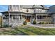 Inviting front porch with detailed trim work, creating a warm and welcoming entrance at 3608 Olive Branch Rd, Greenwood, IN 46143