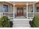 Elegant front porch with double doors, perfect for welcoming guests at 3608 Olive Branch Rd, Greenwood, IN 46143