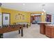 Game room with foosball table, air hockey, and a dart board plus a seating area at 3608 Olive Branch Rd, Greenwood, IN 46143