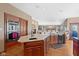 Open kitchen with granite counters, stainless appliances, and hardwood floors at 3608 Olive Branch Rd, Greenwood, IN 46143